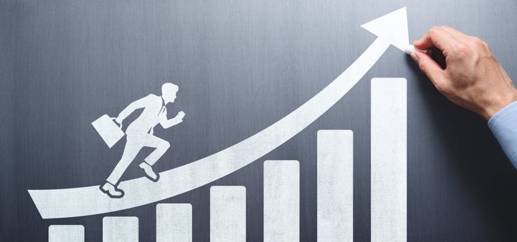 Illustration of a businessperson running along an upward arrow above a rising bar chart, symbolising mezzanine financing supporting acquisition growth and business expansion